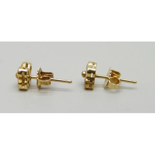7008 - A pair of Tiffany & Co. New York 18ct gold and diamond stud earrings, 2g, approximately 7mm, boxed a... 