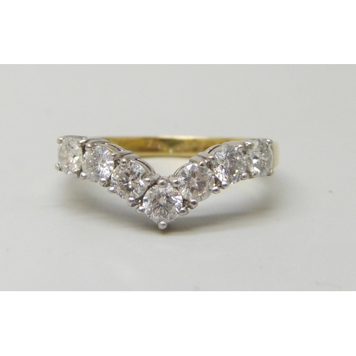 7284 - An 18ct gold seven stone diamond chevron/wishbone ring, total diamond weight 1.00 carat (stamp insid... 