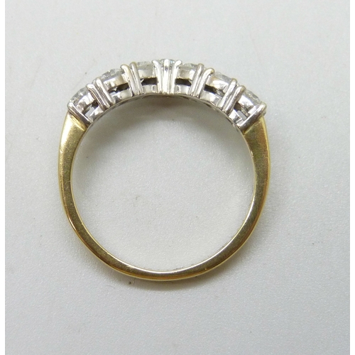 7284 - An 18ct gold seven stone diamond chevron/wishbone ring, total diamond weight 1.00 carat (stamp insid... 