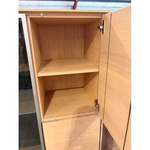 3081 - A two drawer three door wood and glass cabinet (CFL-318-50)