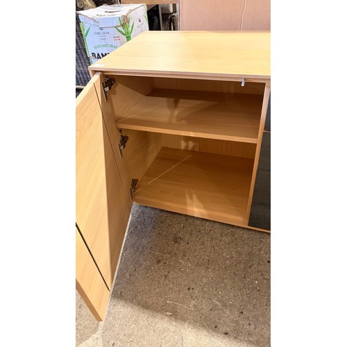 3083 - A four drawer, two door sideboard (CFL-318-63) (marked)
