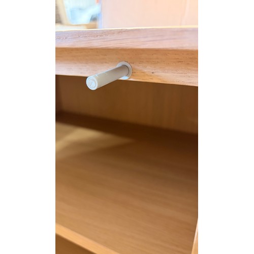 3083 - A four drawer, two door sideboard (CFL-318-63) (marked)