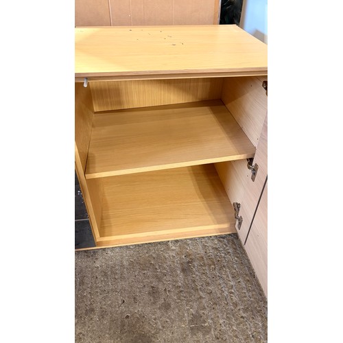 3083 - A four drawer, two door sideboard (CFL-318-63) (marked)