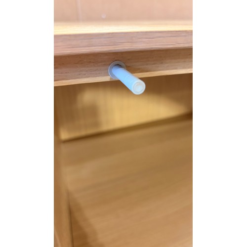 3083 - A four drawer, two door sideboard (CFL-318-63) (marked)