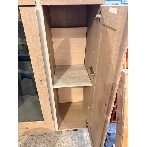 3093 - A two door single drawer wood and glass cabinet (CFL-318-51)