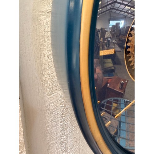 3007A - A navy blue and gold effect moving gear clock