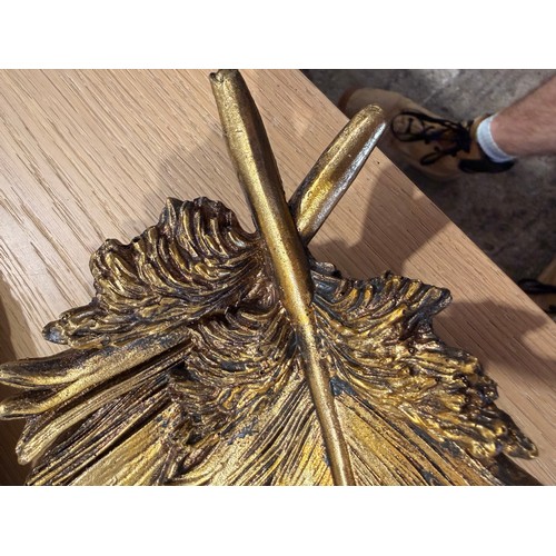 3082B - Three gold painted leaf ornaments
