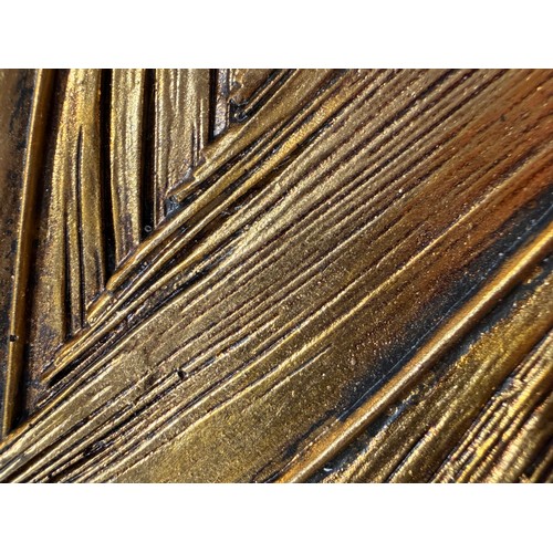 3082B - Three gold painted leaf ornaments