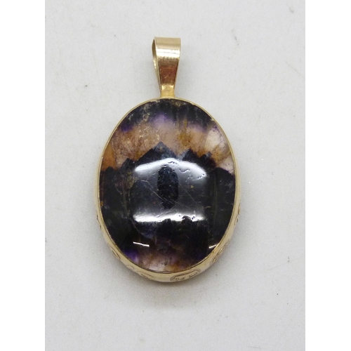 7001 - A 9ct gold mounted Blue John double sided pendant, 8.2g, 3.1cm including bail