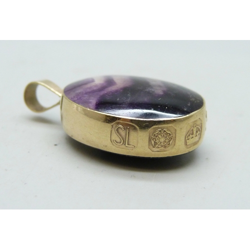 7001 - A 9ct gold mounted Blue John double sided pendant, 8.2g, 3.1cm including bail