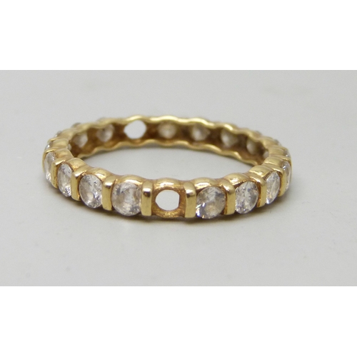 7003 - An 18ct gold ring, some cubic zirconia stones missing, 3.6g, V
