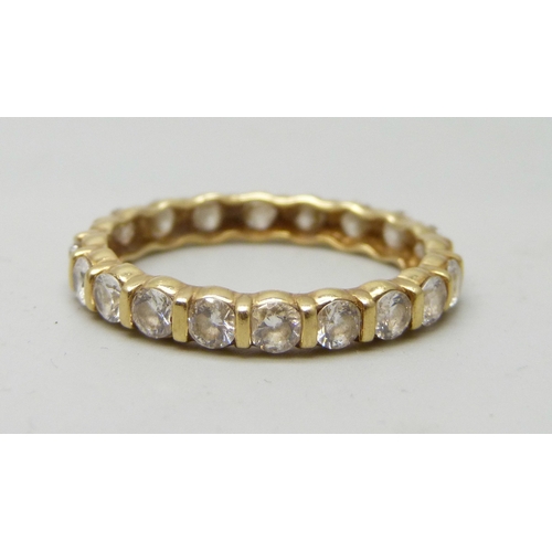 7003 - An 18ct gold ring, some cubic zirconia stones missing, 3.6g, V