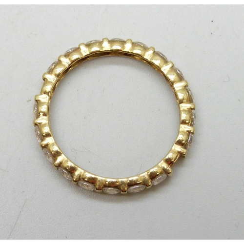 7003 - An 18ct gold ring, some cubic zirconia stones missing, 3.6g, V