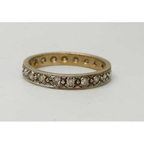 7012 - A 9ct gold and diamond eternity ring, 2.9g, S