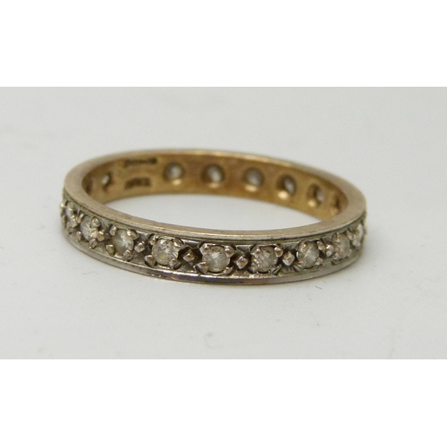 7012 - A 9ct gold and diamond eternity ring, 2.9g, S