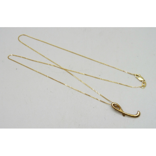 7019 - A 9ct gold pendant, 2.3cm, on a 9ct gold necklace chain, 2.2g total