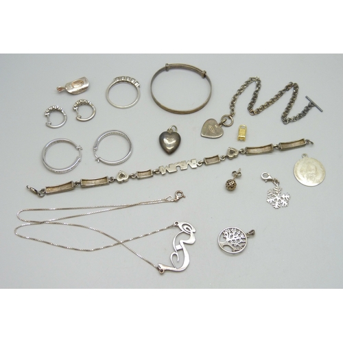 7022 - A collection of silver and white metal jewellery, 49g total