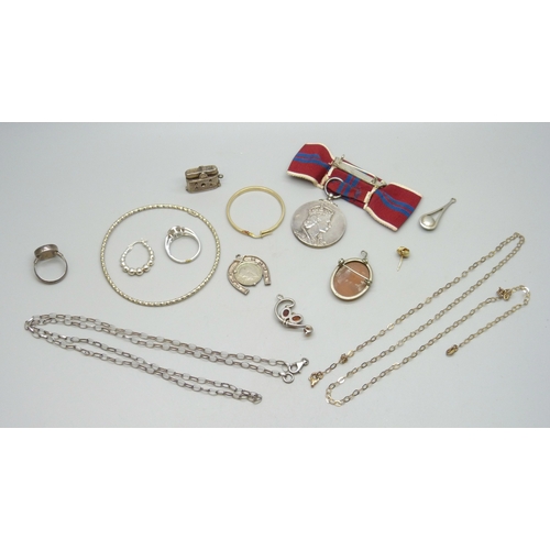 7023 - A 1953 Coronation medal, a silver Nuvo charm, a silver bangle, a single 9ct gold hoop earring (0.8g)... 