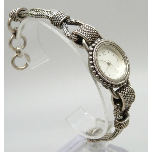 7024 - A Suarti silver wristwatch, marked 925 BA, 48g, 26mm, case back stainless steel