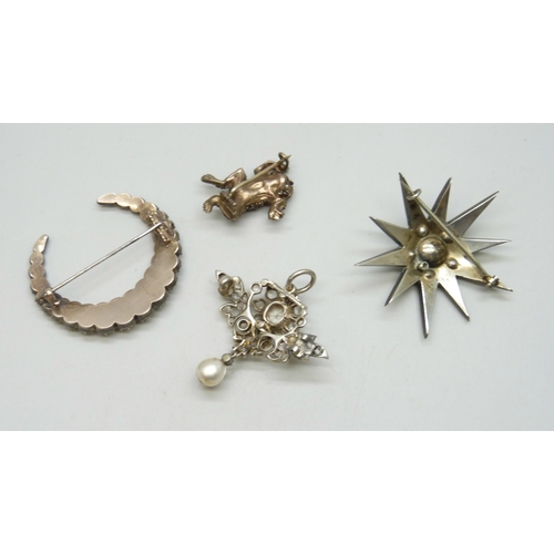 7034 - A Victorian starburst brooch, 4.5cm, a Victorian crescent brooch, both set with paste stones, a Bohe... 