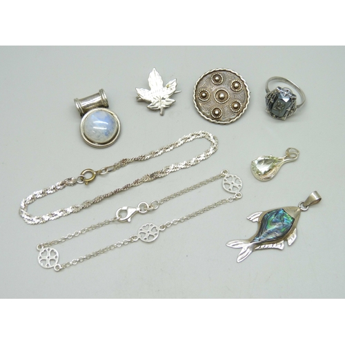 7035 - A collection of silver jewellery including a Scottish silver brooch, 23g, and a plated bracelet