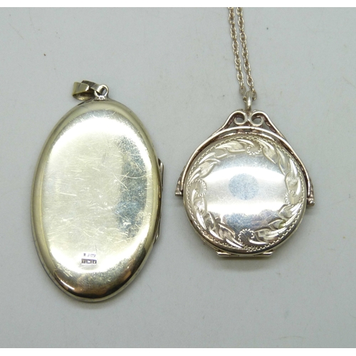 7036 - Two silver lockets, one on a silver chain, including a swivel example, 22g total