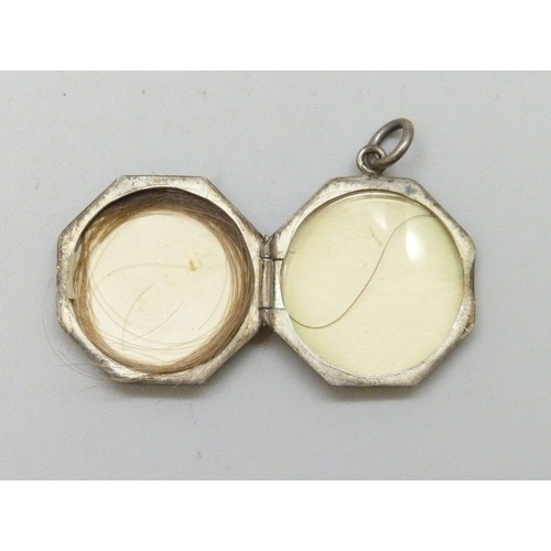 7037 - A collection of silver jewellery, 36g, a white metal mounted Art Deco rock crystal pendant, and a pl... 