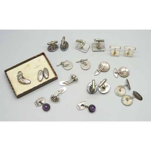 7038 - A collection of silver and white metal cufflinks including Scottish examples, 90g total