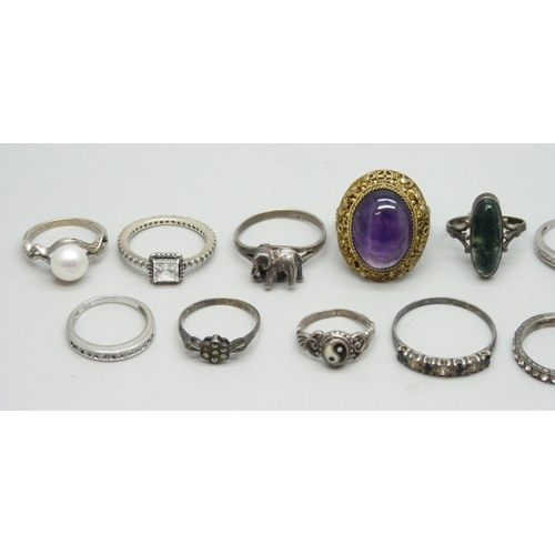 7042 - A collection of silver rings including a Pandora example and Chinese export, 40g total