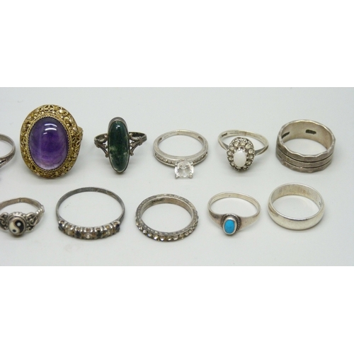 7042 - A collection of silver rings including a Pandora example and Chinese export, 40g total