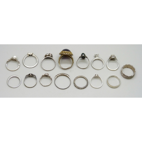 7042 - A collection of silver rings including a Pandora example and Chinese export, 40g total