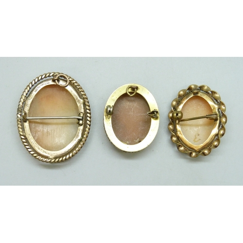 7045 - Two rolled gold cameo brooches, and a gilt cameo brooch (a/f)