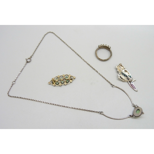 7048 - A silver and plique-a-jour enamel bird brooch, 4.1cm, a silver Arts & Crafts style necklace, an unma... 