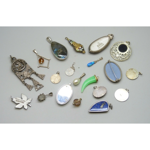 7052 - A collection of jewellery including two silver St Christopher pendants, and costume jewellery