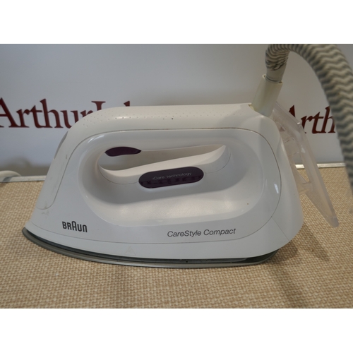 6020 - A Braun Carestyle compact steam iron, (388-235) *This lot is subject to VAT