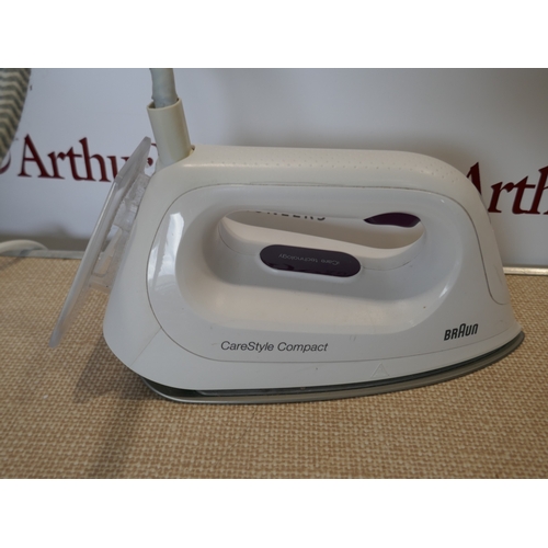 6020 - A Braun Carestyle compact steam iron, (388-235) *This lot is subject to VAT