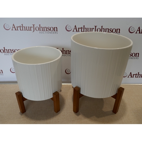 6022 - A set of Inside Out - bamboo planters (388-535) *This lot is subject to VAT