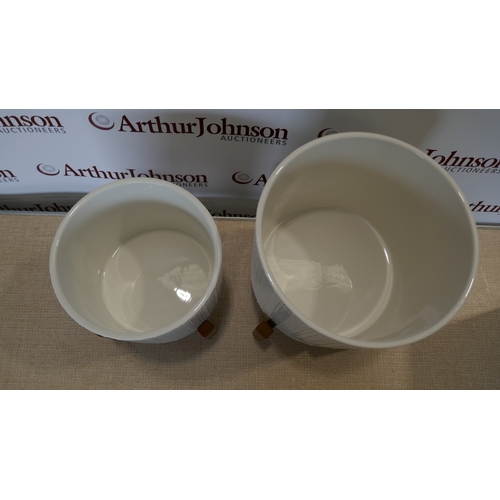 6022 - A set of Inside Out - bamboo planters (388-535) *This lot is subject to VAT