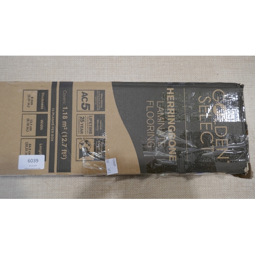 6039 - A box of Golden Select herringbone laminate flooring,  (388-493) *This lot is subject to VAT
