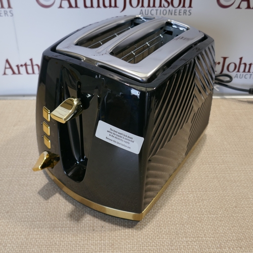 6059 - Two toasters to include Russel Hobbs *This lot is subject to VAT