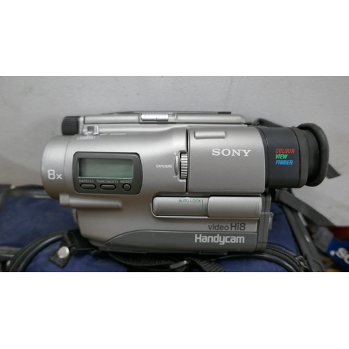 5026 - Three assorted cameras including a Sony Handycam 72x digital zoom camera recorder, a Sony DSC-570 di... 
