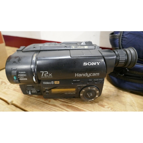5026 - Three assorted cameras including a Sony Handycam 72x digital zoom camera recorder, a Sony DSC-570 di... 