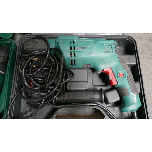 5029 - A Bosch PSR12, 12V battery powered drill and charger and a Parkside DSBM 500, 230V drill