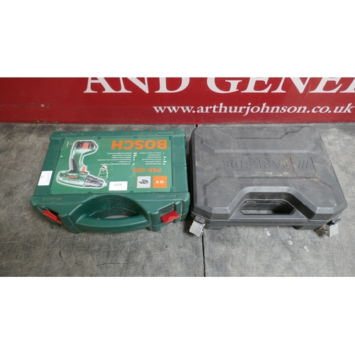 5029 - A Bosch PSR12, 12V battery powered drill and charger and a Parkside DSBM 500, 230V drill