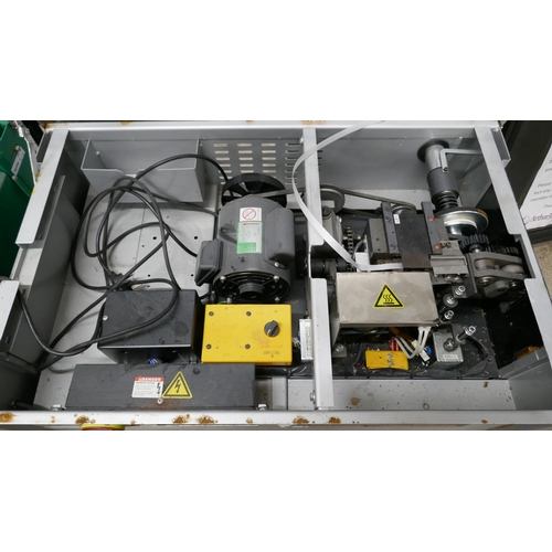 5056 - An Optimax heavy duty 230V strapping machine model TMS300  *This lot is subject to VAT