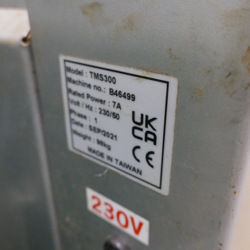 5056 - An Optimax heavy duty 230V strapping machine model TMS300  *This lot is subject to VAT