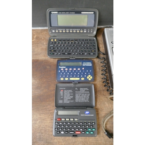 5001 - A quantity of assorted items including portable DVD player, Franklin Spelling Ace, Sudoku player, et... 