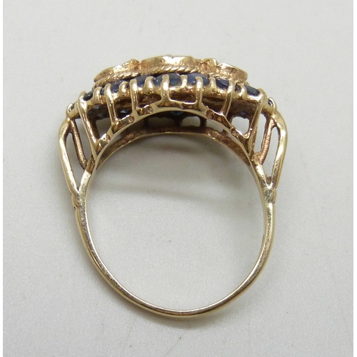 7001 - A 9ct gold, sapphire and opal cluster ring, 4.8g, O, some sapphires a/f