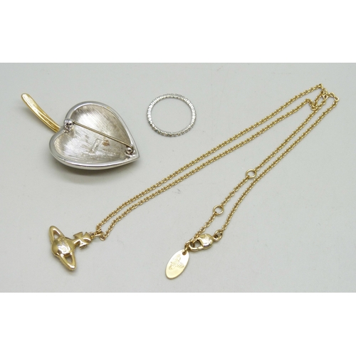 7014 - A Vivienne Westwood orb necklace, a Monet brooch, and a Swarovski ring (a/f)