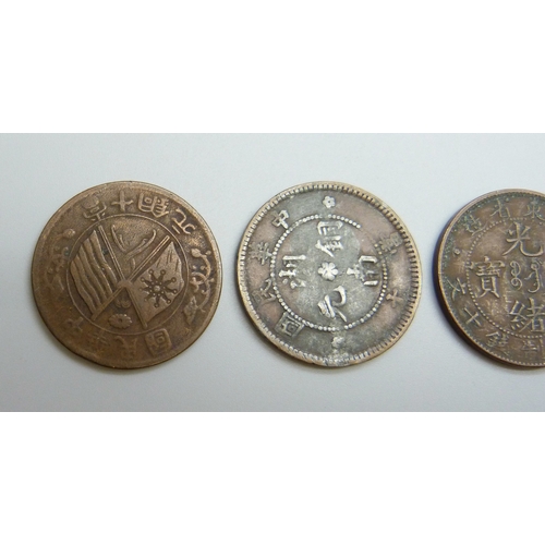 7043 - Three Chinese 10 cash coins, 21g